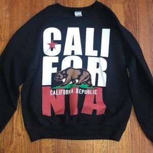 A long sleeve black sweater